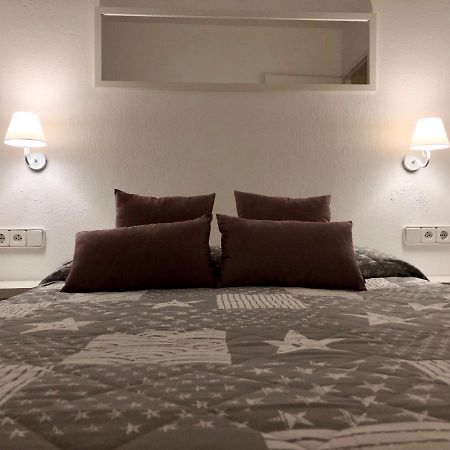 Apartaments S'Arenella Cadaqués Pokoj fotografie